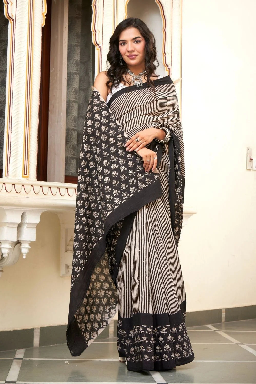 Black and white hand block printed mulmul cotton saree.