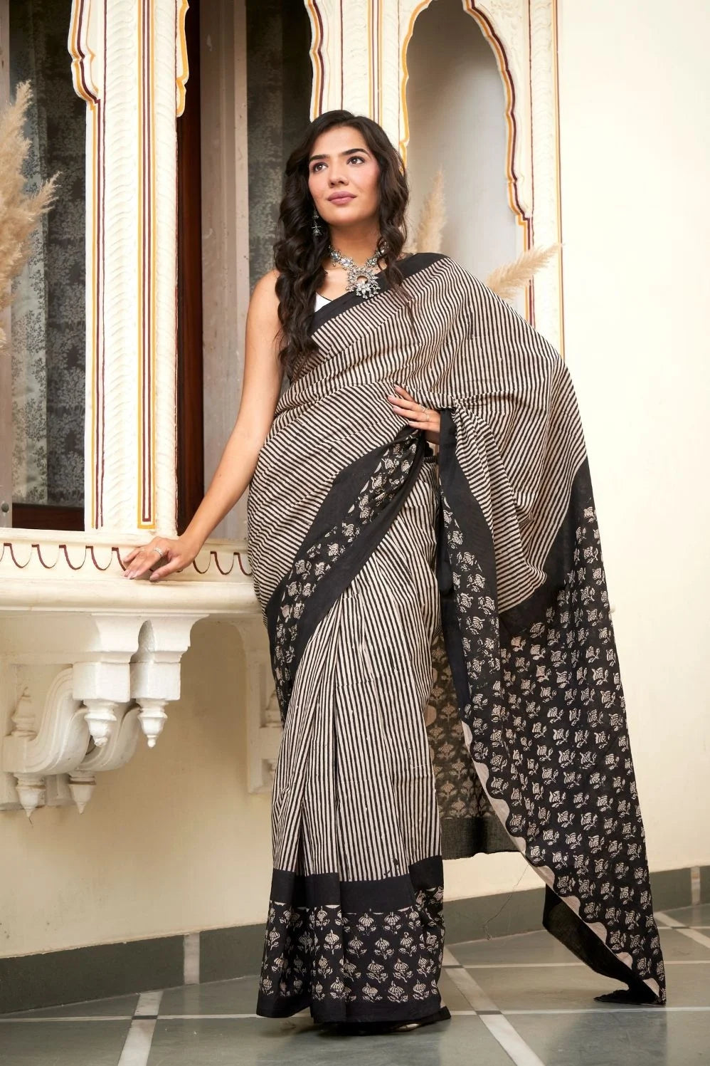 Black and white hand block printed mulmul cotton saree.