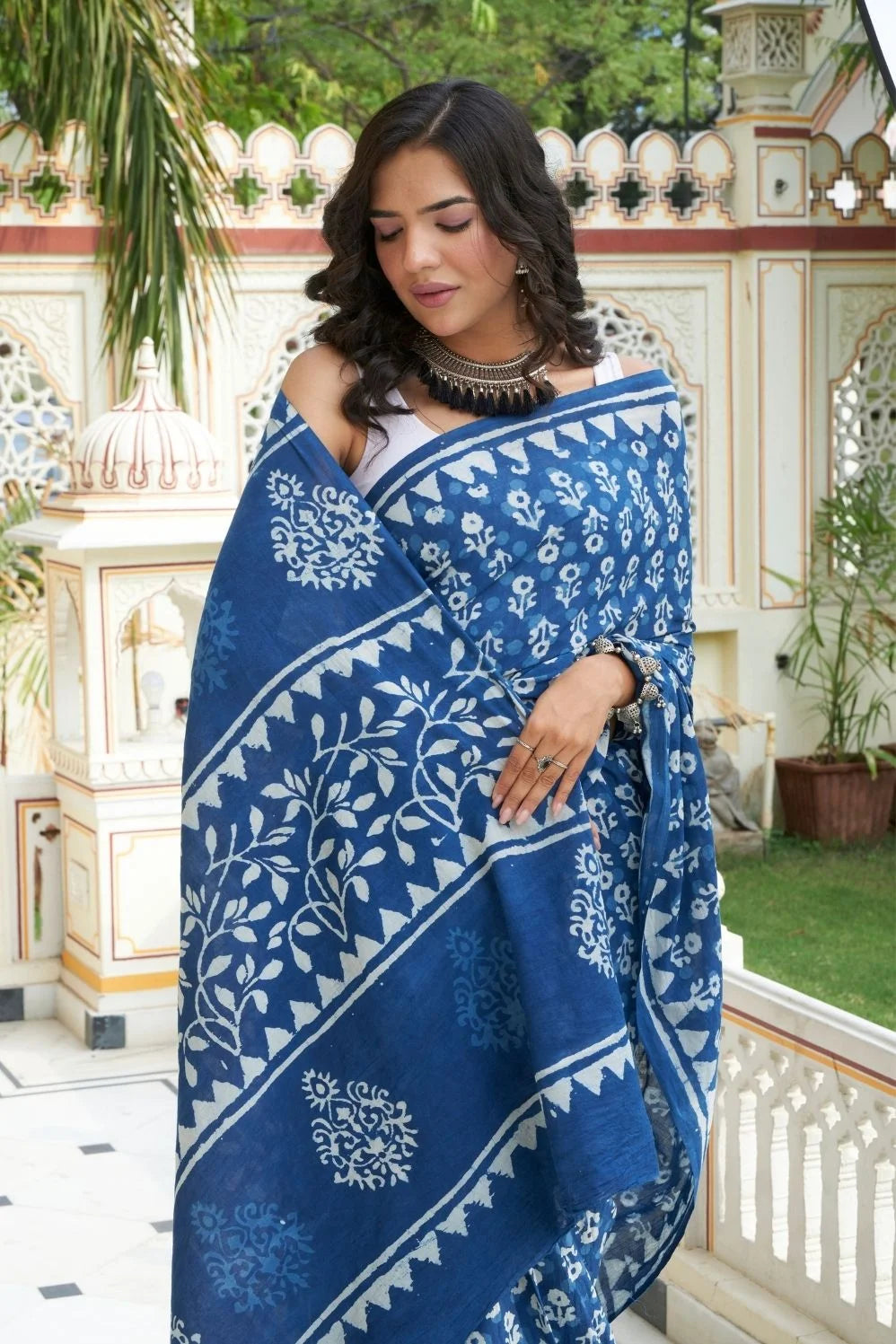 Blue mulmul cotton saree with hand block print and soft mulmul fabric.