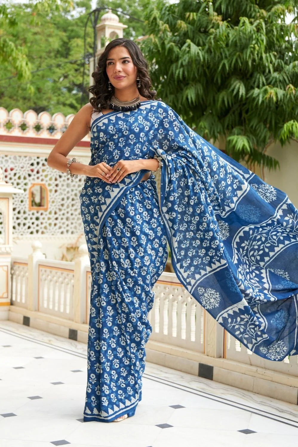 Blue mulmul cotton saree with hand block print and soft mulmul fabric.