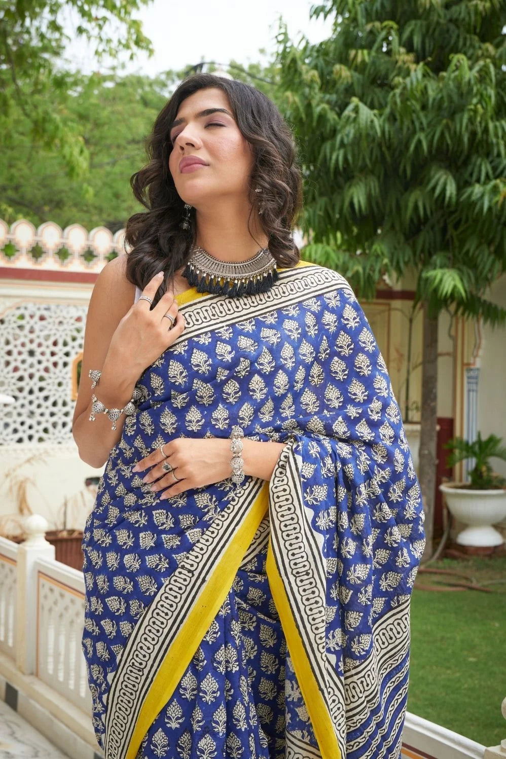 Blue and yellow hand block printed mulmul cotton saree.