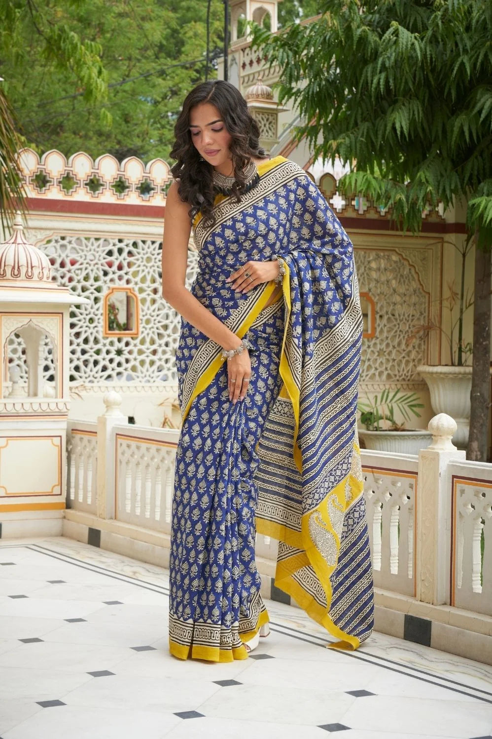 Blue and yellow hand block printed mulmul cotton saree.