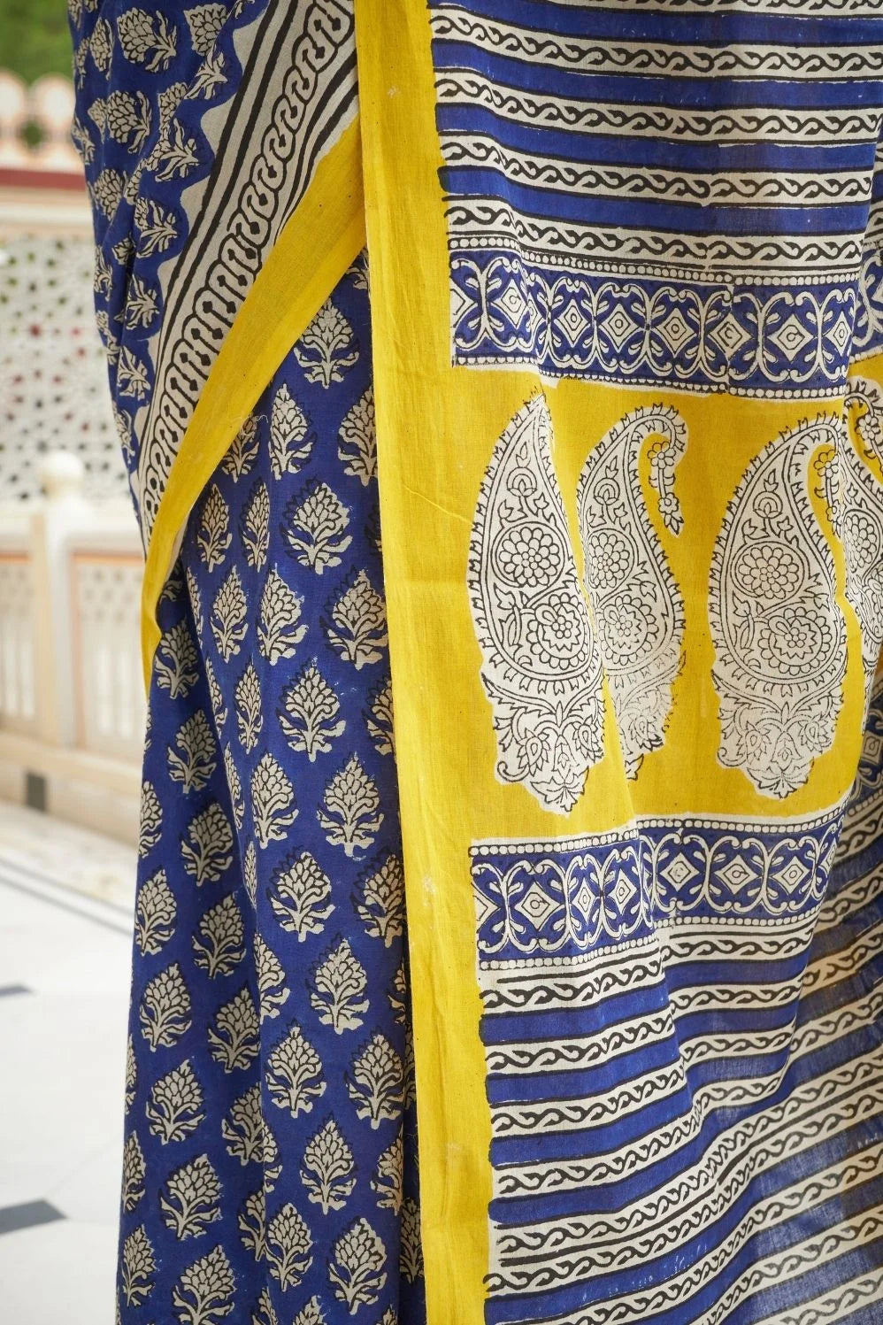Blue and yellow hand block printed mulmul cotton saree.