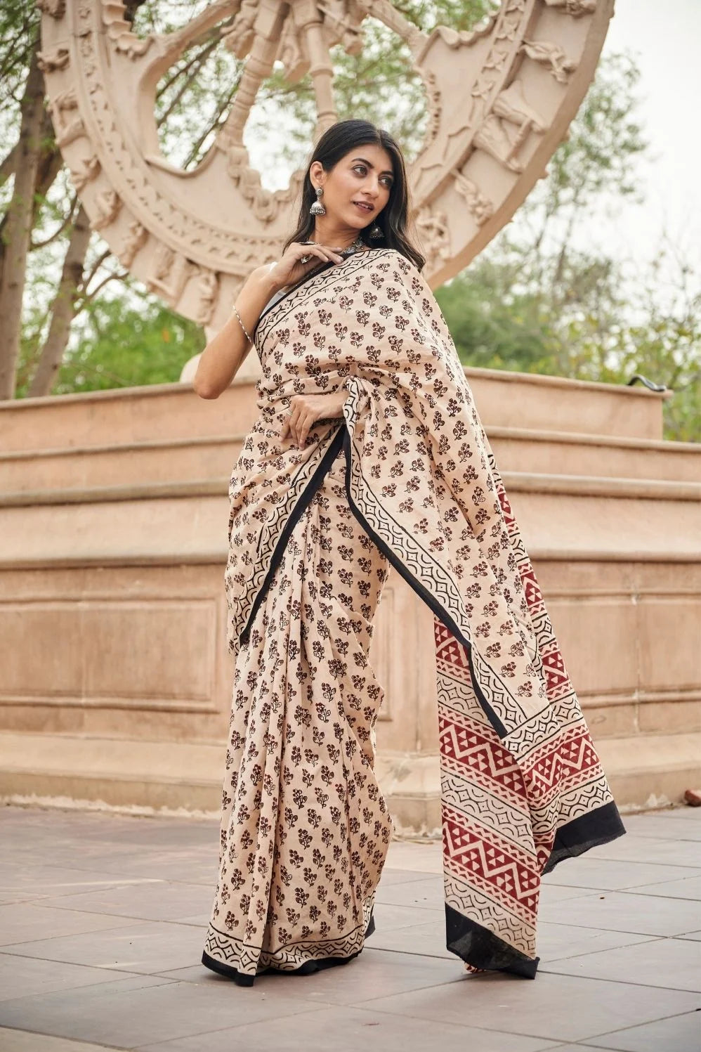 Cream Red Mulmul cotton saree with artistic block printing