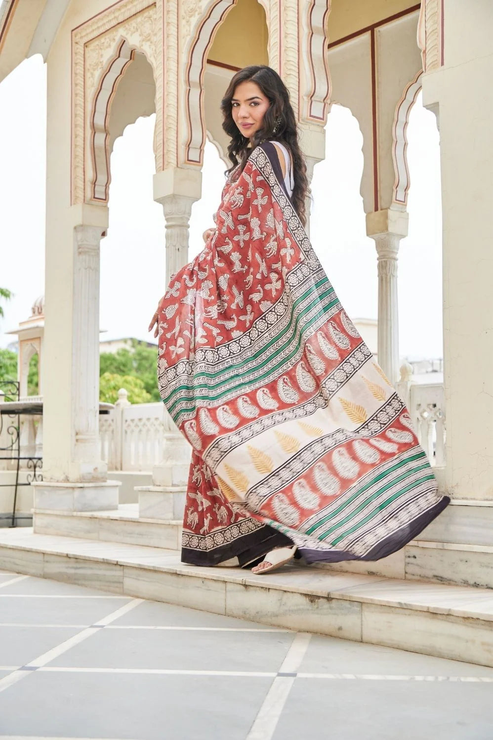 Elegance red mulmul cotton saree in animal motifs