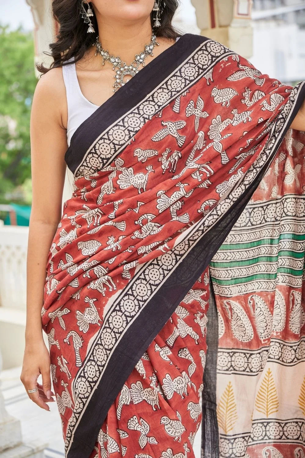 Elegance red mulmul cotton saree in animal motifs