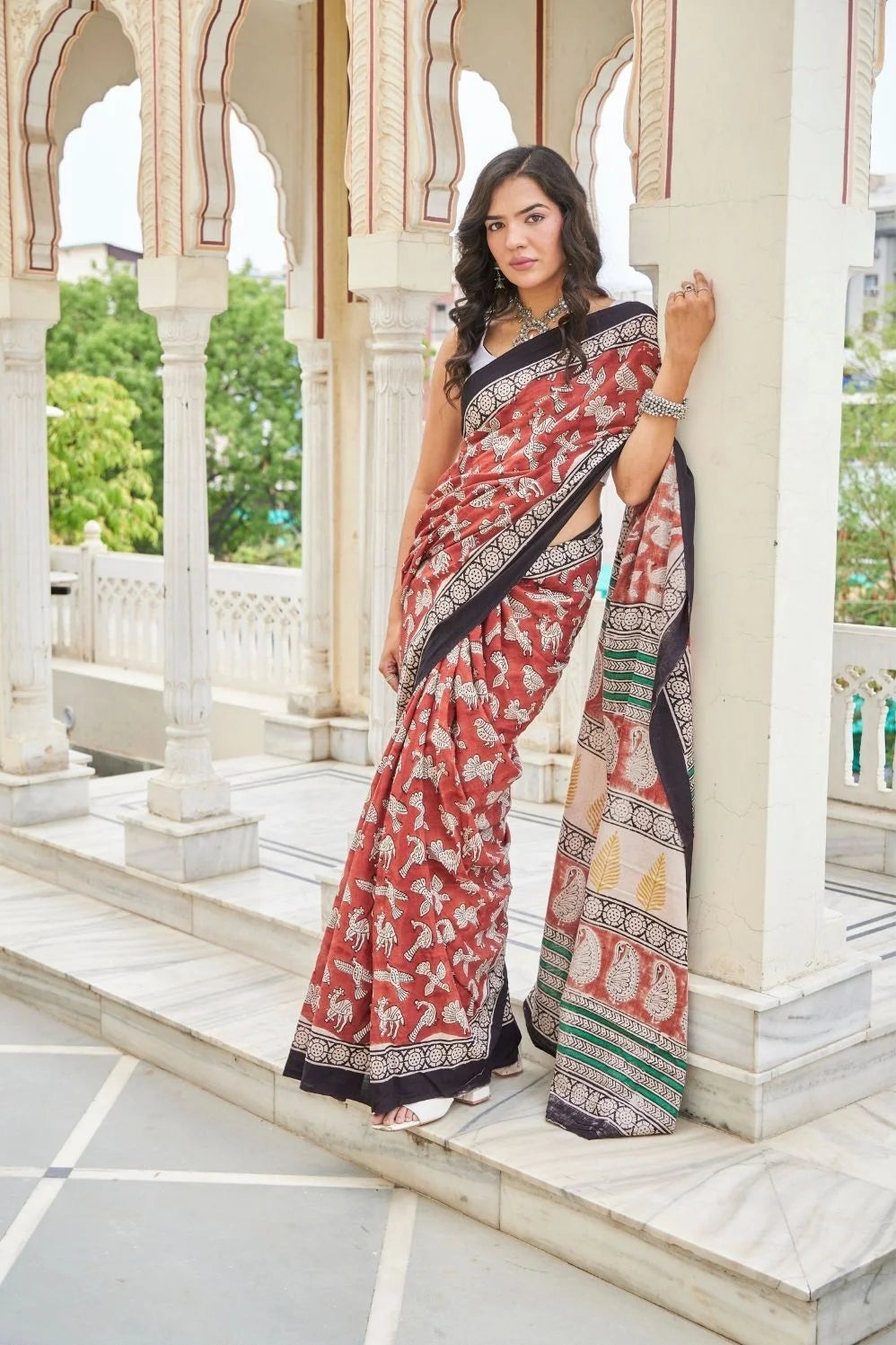 Elegance red mulmul cotton saree in animal motifs