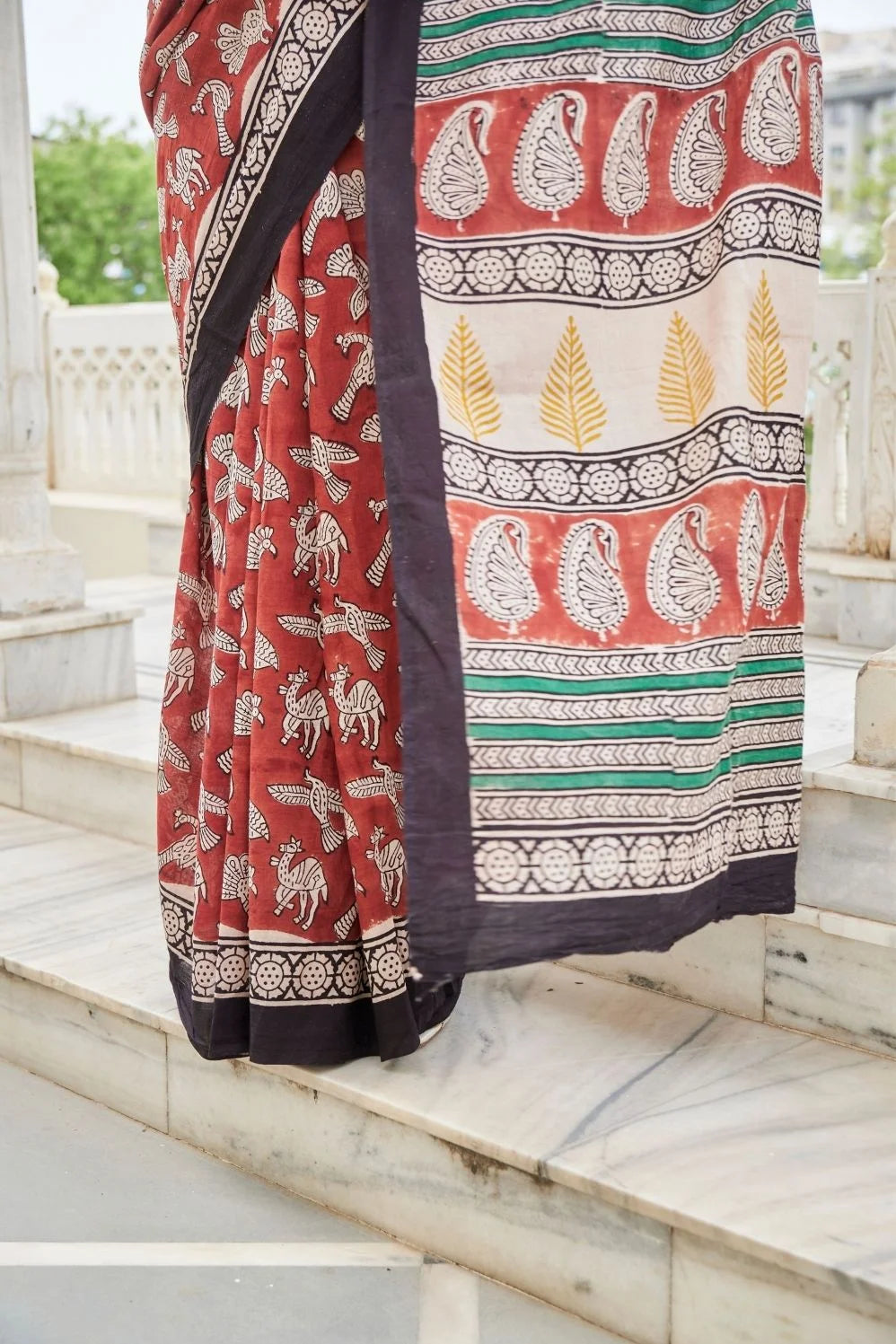 Elegance red mulmul cotton saree in animal motifs
