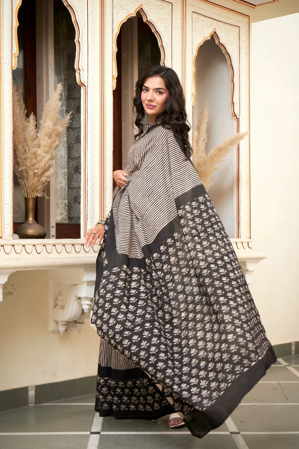 Black and white hand block printed mulmul cotton saree.