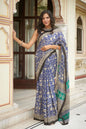Blue and green mulmul cotton saree with detailed hand block print.