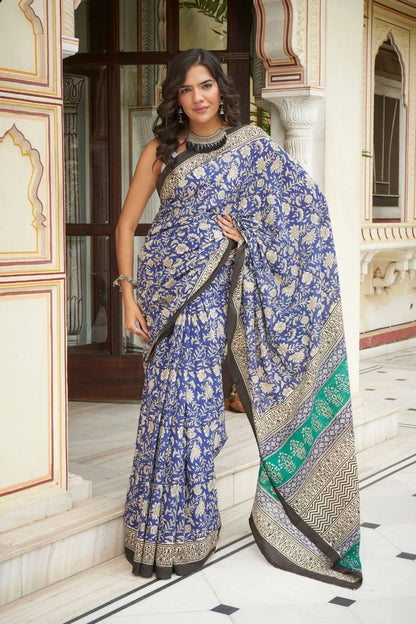 Blue and green mulmul cotton saree with detailed hand block print.