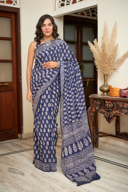 Dark blue mulmul cotton saree with intricate block prints.