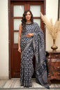 Deep blue mulmul cotton saree with elegant block print.
