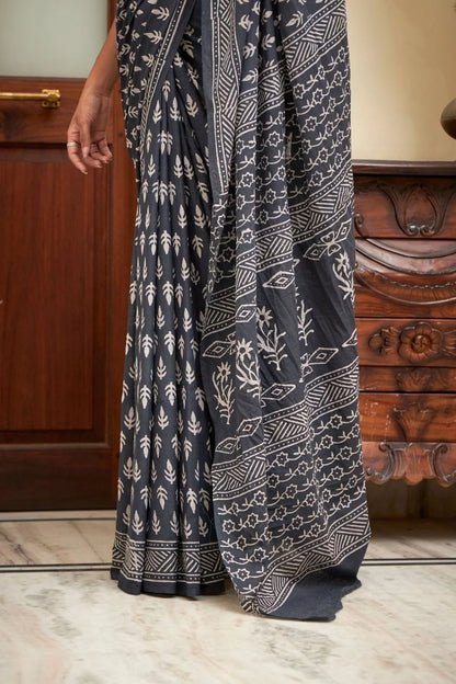 Deep blue mulmul cotton saree with elegant block print.