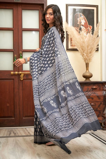 Deep blue mulmul cotton saree with elegant block print.