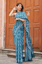 Green mulmul cotton saree with stunning hand block designs.