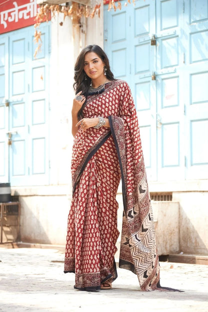Hot red mulmul cotton saree with artistic block prints.