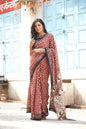 Hot red mulmul cotton saree with artistic block prints.