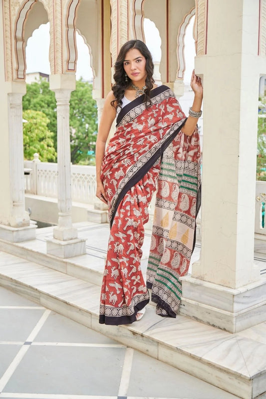 Elegance red mulmul cotton saree in animal motifs