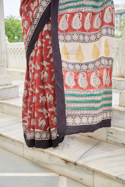 Elegance red mulmul cotton saree in animal motifs