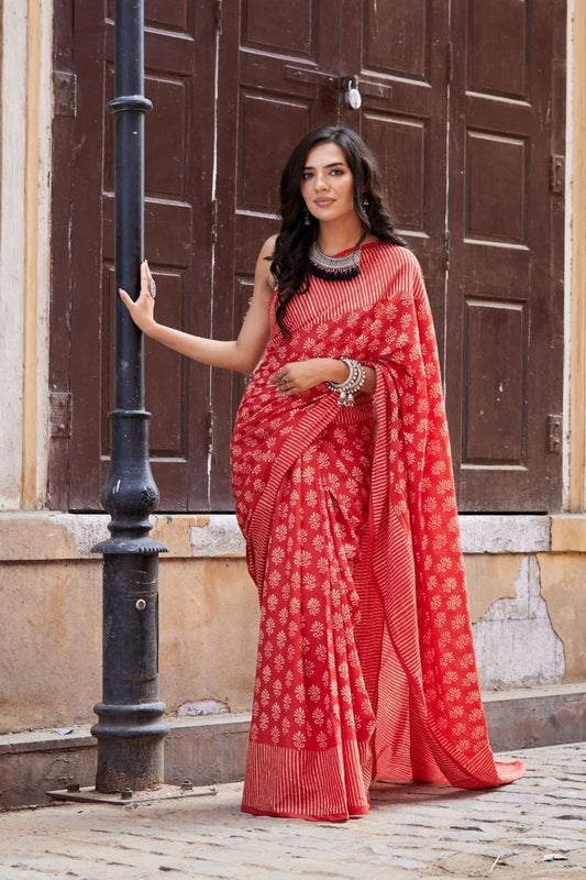 Red mulmul cotton saree with hand block design.