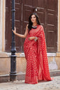 Red mulmul cotton saree with hand block design.