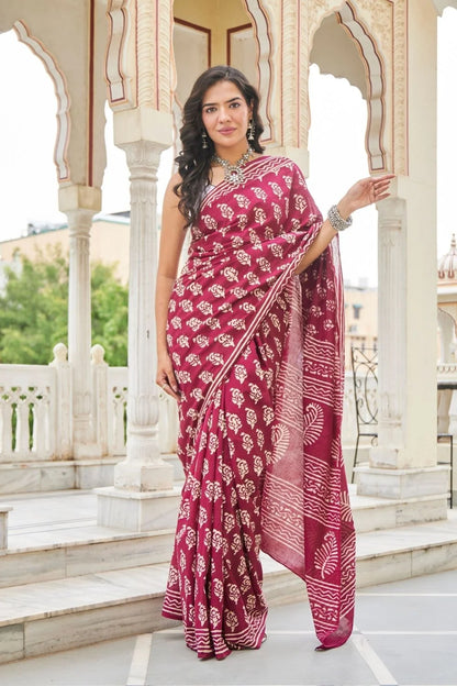 Wine red mulmul cotton saree with delicate hand block work.