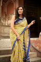 Yellow and blue cotton saree with handcrafted block prints.