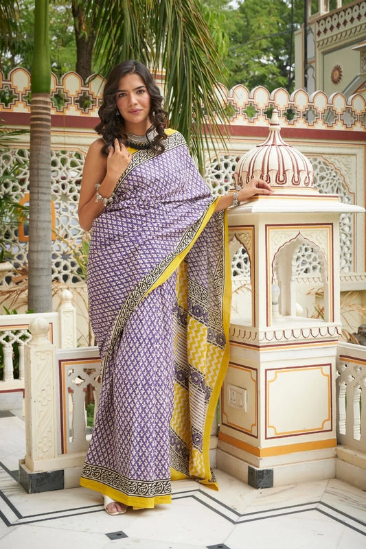 Yellow and blue Mulmul cotton saree with handcrafted block prints.